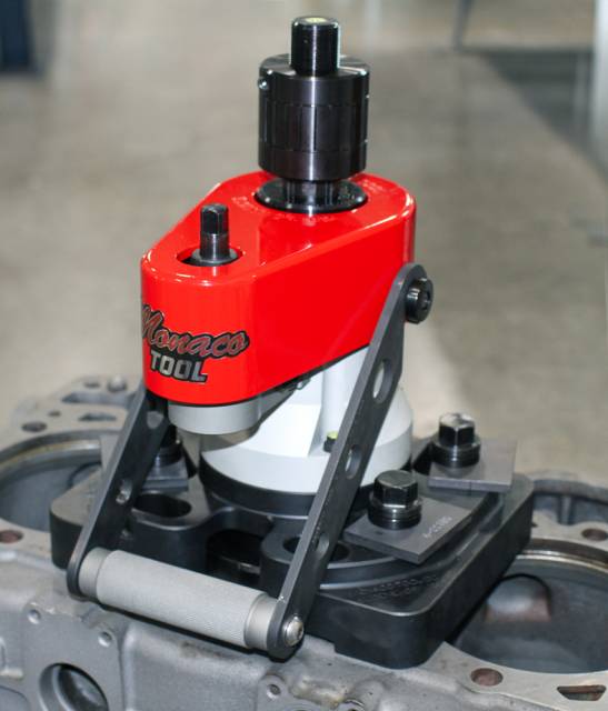 M52050 counterbore sleeving tool in use on diesel engine block top deck.